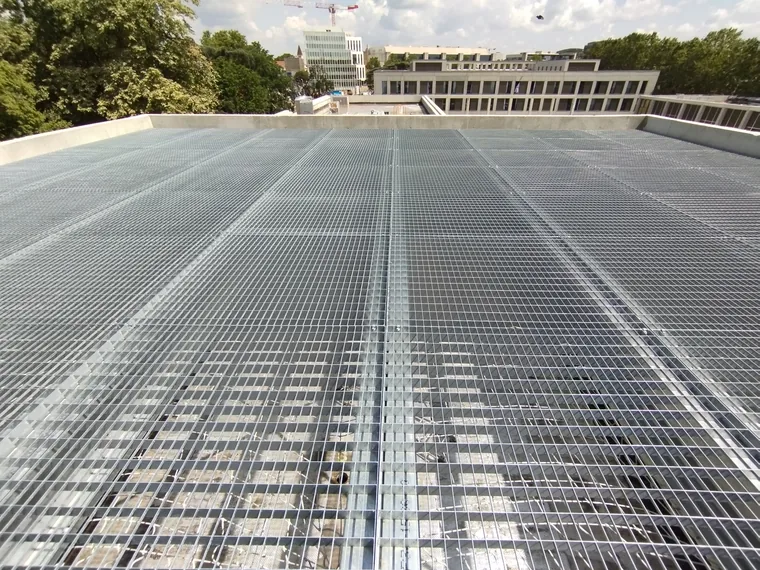 grating lets water, air and light through while offering a strong and durable surface
