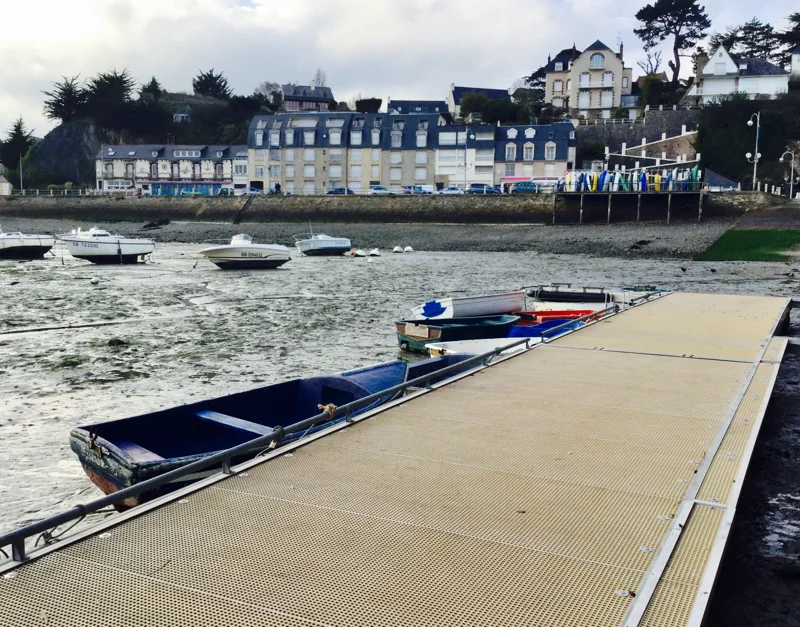 FRP grating pontoon submerged at high tide.