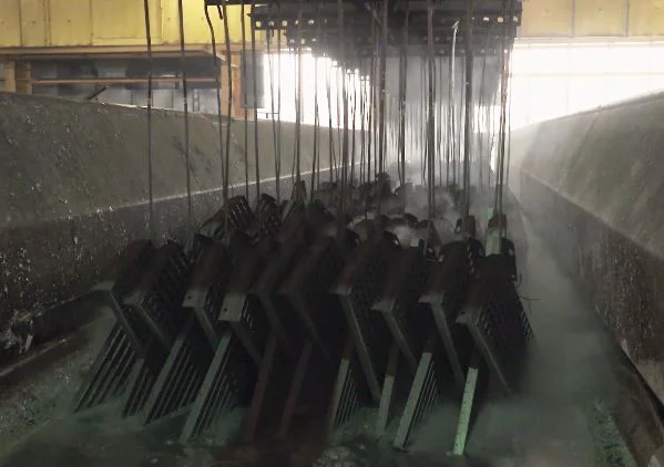 Galvanizing - dipping in a zinc bath