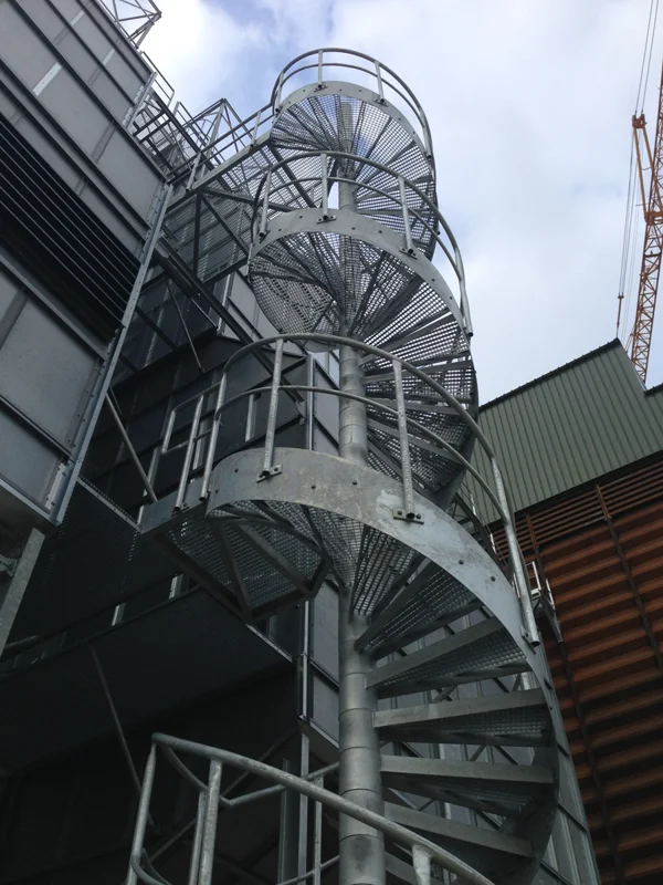 spiral staircase made in grating for access to the upper floor