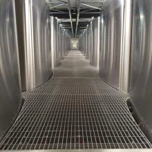 référence réalisation chai avec sol métallique en caillebotis pressé inoxydable