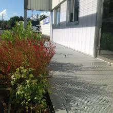 référence réalisation entrée de bâtiment en grille tole picot